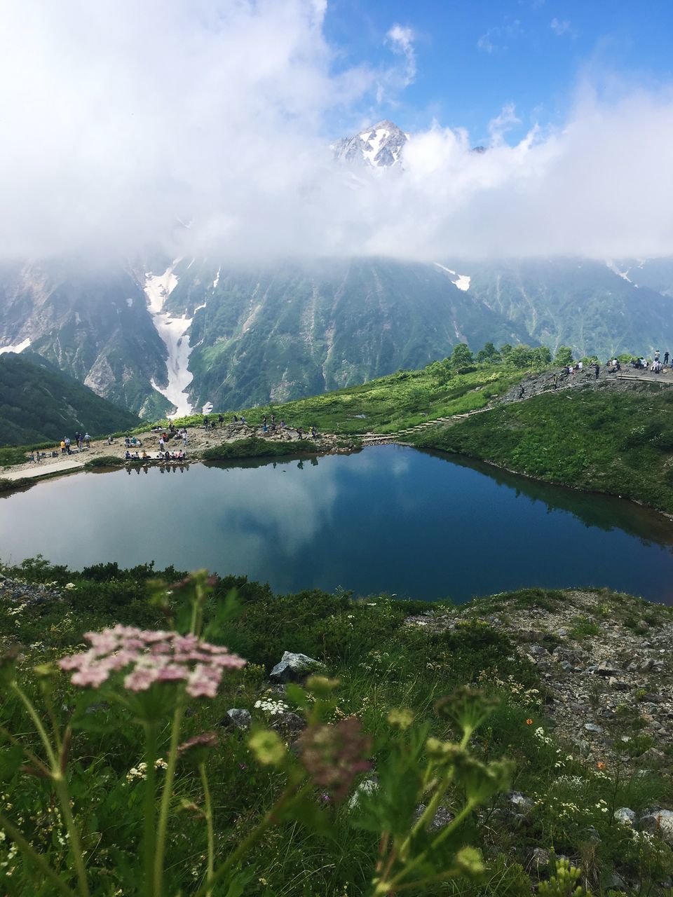 mountain, beauty in nature, scenics - nature, cloud - sky, sky, water, environment, tranquility, tranquil scene, nature, mountain range, day, landscape, plant, no people, non-urban scene, lake, idyllic, reflection, outdoors, mountain peak