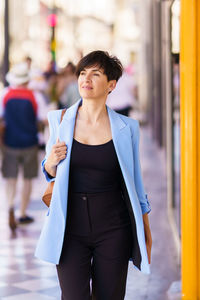 Young woman standing in city