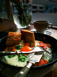 Close-up of breakfast served on table