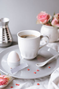 Close-up of coffee cup on table