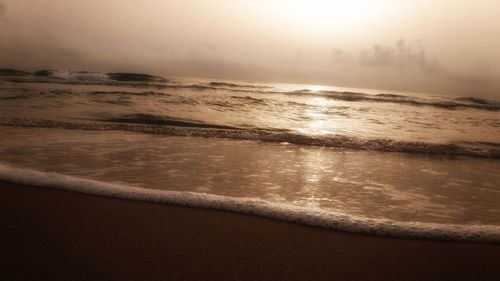 Scenic view of sea at sunset
