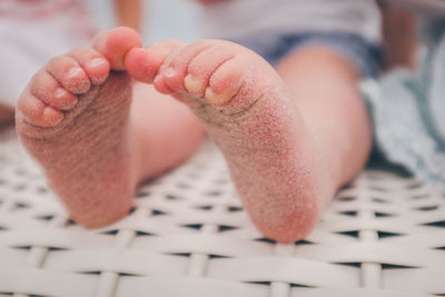 Low section of child on chair