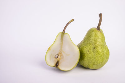 Close-up of fruit against white background