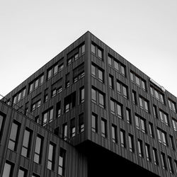 Low angle view of modern building against clear sky