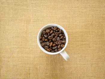 High angle view of coffee beans on table