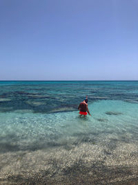 Scenic view of sea against clear sky