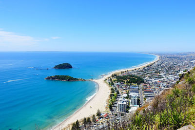 High angle view of beach against blue sky