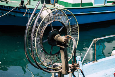 Close-up of fishing boat moored in winter