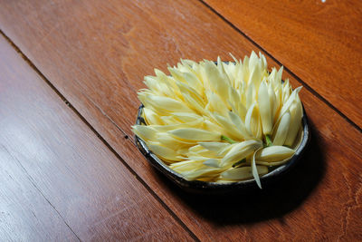 High angle view of white flower on table