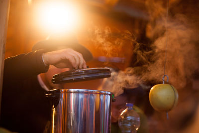 Close-up of hand holding drink