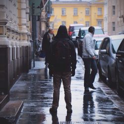 Full length of woman walking in city