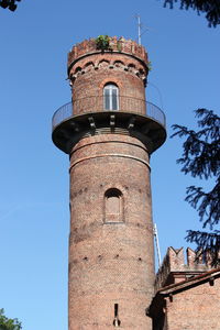 Low angle view of lookout tower at monza park against sky