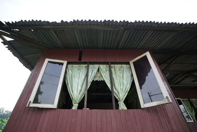 Low angle view of house against sky