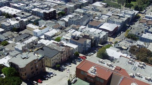 High angle view of street amidst buildings in city