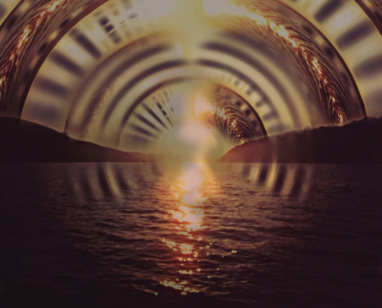 reflection, water, built structure, architecture, motion, arch, indoors, blurred motion, illuminated, waterfront, lens flare, connection, sunlight, tunnel, long exposure, transportation, no people, bridge - man made structure, diminishing perspective, sunset