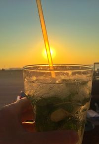 Close-up of hand holding drink