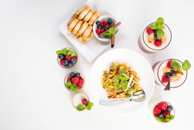 High angle view of fruit salad on white background