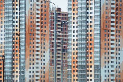 Low angle view of skyscrapers against sky