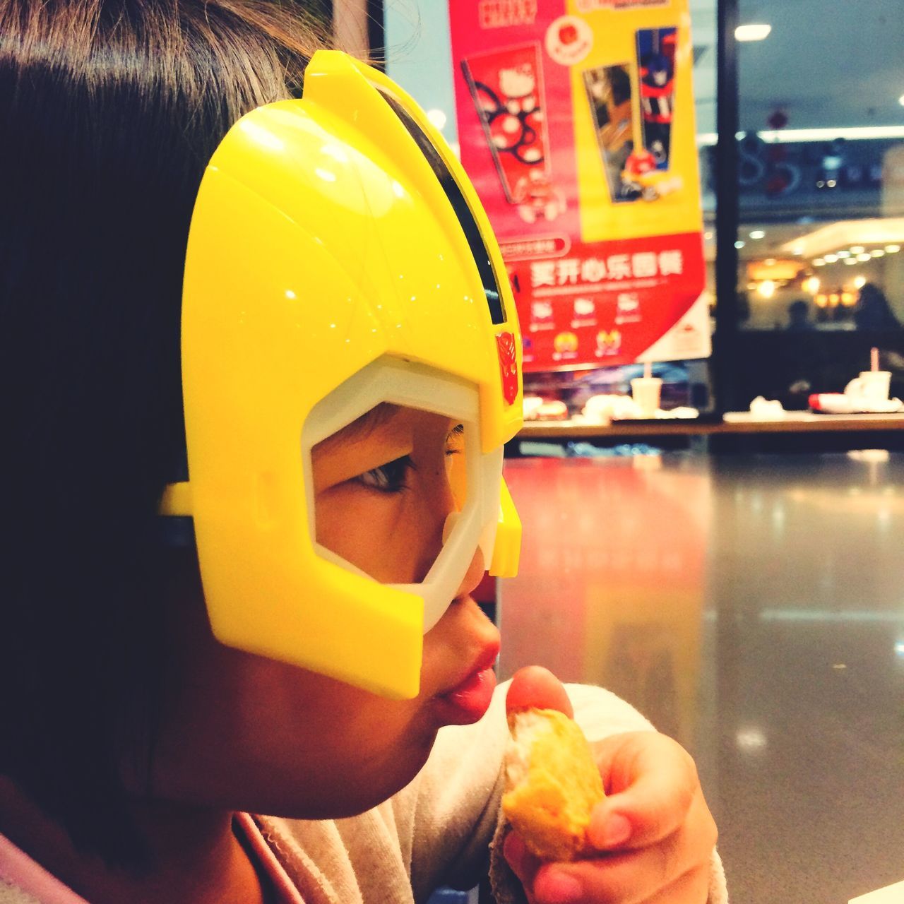 headshot, holding, yellow, person, casual clothing, human face, focus on foreground