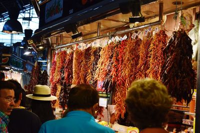 People at market stall