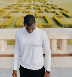 Full length of young man looking at camera