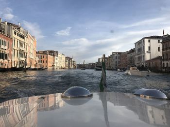 Buildings in city against sky