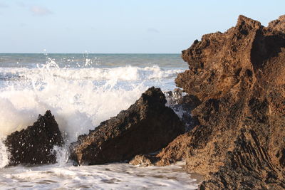 Panoramic view of sea against clear sky