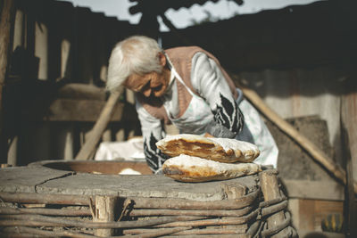 Man preparing food on table