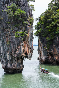 Scenic view of rock formation amidst sea