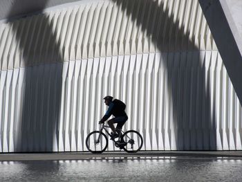 Side view of a bicycle against the wall