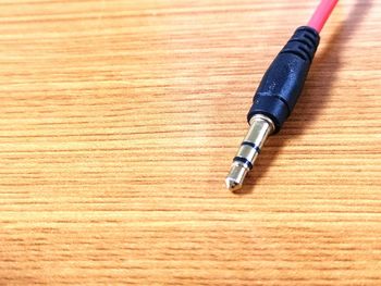 Close-up of pen on table