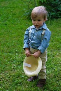 Boy holding a field