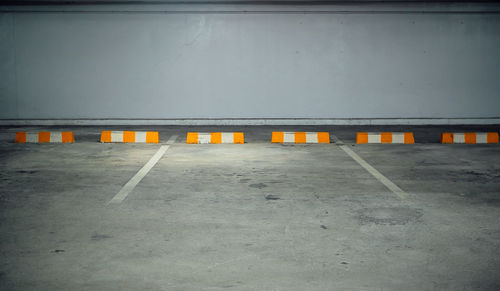 Empty parking lot against building