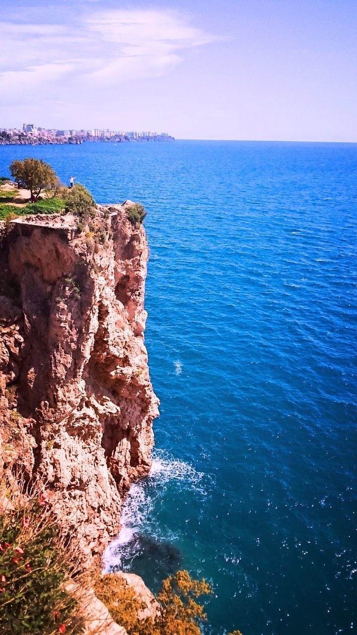 scenics, beauty in nature, nature, sea, tranquil scene, rock formation, water, tranquility, horizon over water, rock - object, day, outdoors, sky, no people, blue, cliff