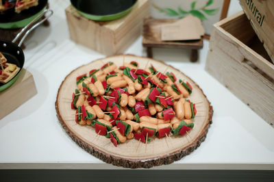 High angle view of chopped vegetables in plate on table