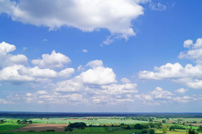 Scenic view of landscape against cloudy sky