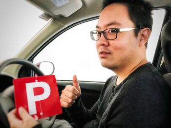 Young man in car