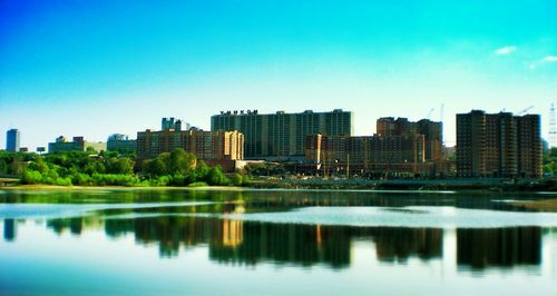 Reflection of buildings in calm water