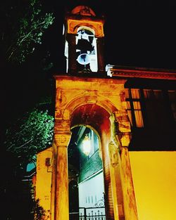 Low angle view of tower at night