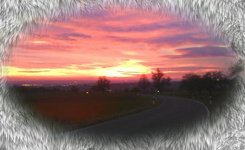 Scenic view of sunset over sea