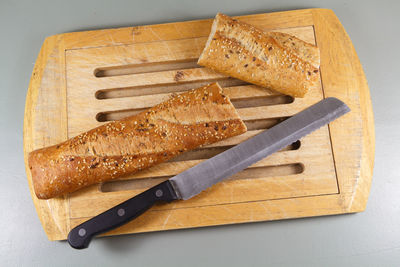 High angle view of bread on cutting board