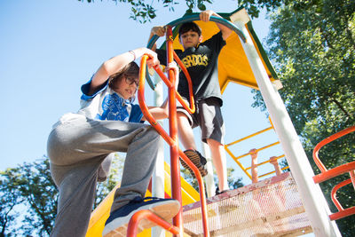 Children playing in jungle gym
