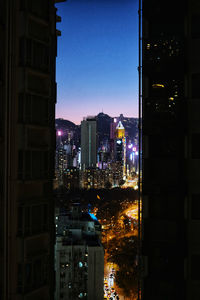 Illuminated buildings in city at night