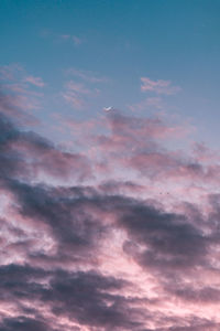 Low angle view of dramatic sky during sunset