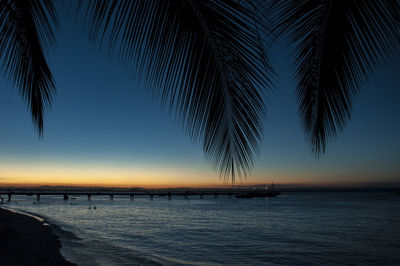 Scenic view of sea against sky at sunset