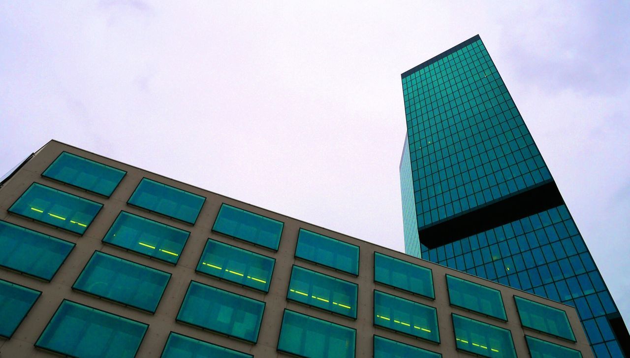 building exterior, architecture, low angle view, built structure, modern, city, office building, skyscraper, tall - high, building, tower, sky, window, glass - material, clear sky, day, outdoors, tall, no people, residential building