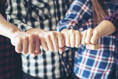 Close-up of people hands