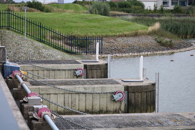 People on footpath by canal