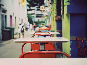 Empty chairs and table in cafe