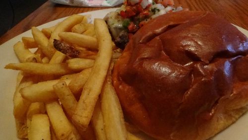 Close-up of meat and fries